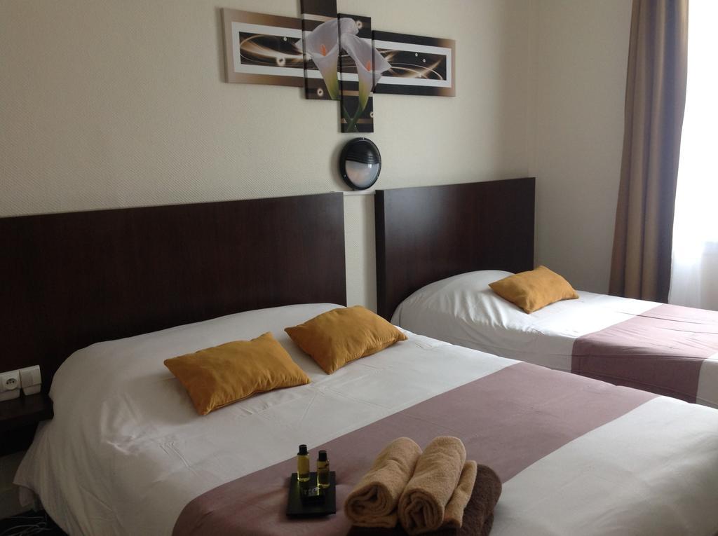 Hotel De La Paix ก็อง ห้อง รูปภาพ