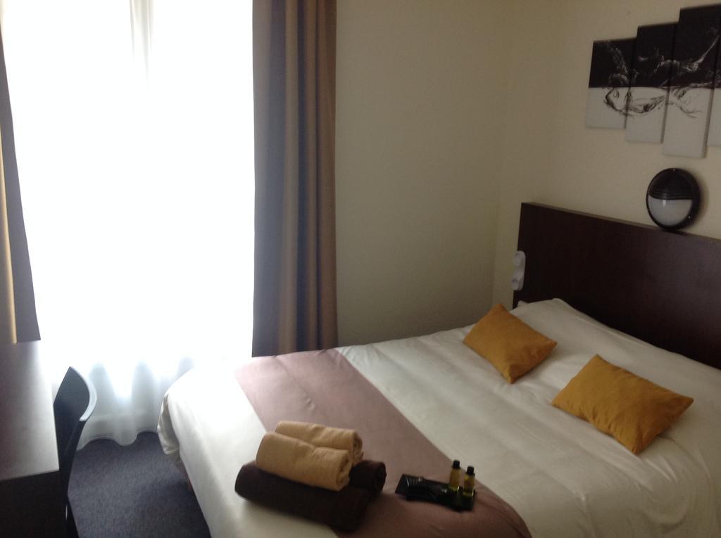 Hotel De La Paix ก็อง ห้อง รูปภาพ